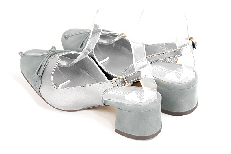 Women's pearl grey and silver elegant slingback heels, with a bow on the front. Round toe. Low flare heels - Rear view